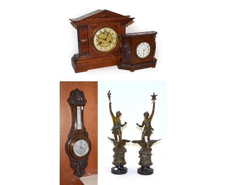 An oak cased mantel clock with Junghans movement, a mahogany mantel timepiece, a pair of French spelter figures and an oak ca