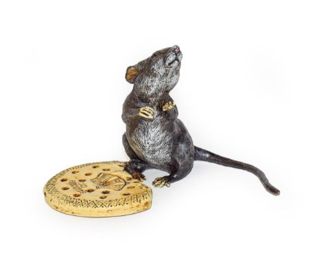 A cold painted bronze advertising figure of a rat on a biscuit, inscribed Cao Biscuits, 12cm high.  Some slight wear and pain
