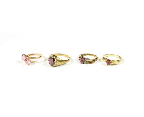 A 9 carat gold cubic zirconia ring, finger size N; two 9 carat gold gem set rings; and a cluster ring, stamped '333' .  Three