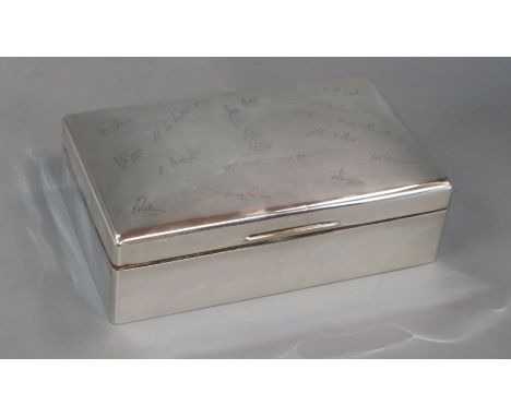 A George VI silver cigarette box, engraved with signatures, Mappin &amp; Webb, London, 1940, 22.8cm.