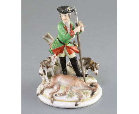 A Meissen group of a huntsman with hounds and prey, 19th century, incised model no. '223', underglaze blue crossed swords mar