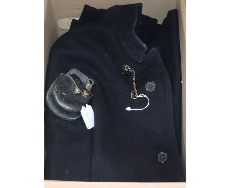 A vintage policemans cape, three whistles and a holster