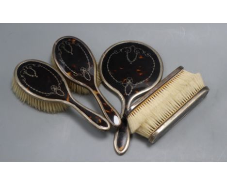 A 1920's silver and tortoiseshell five piece mirror and brush set by Mappin &amp; Webb.