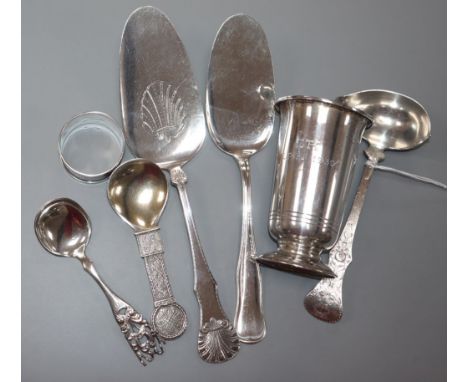 A Norwegian white metal small vase, two similar servers, a napkin ring, two small spoons and a ladle.