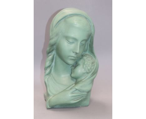 A green painted plaster model of Madonna and child height 33cm