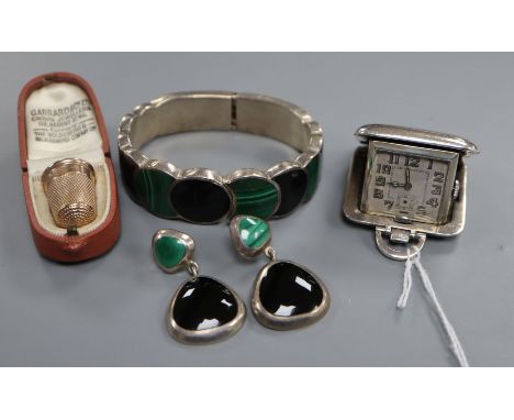 A late Victorian 9ct gold thimble in Garrard &amp; Co leather case, a silver travelling watch and Mexican sterling, malachite