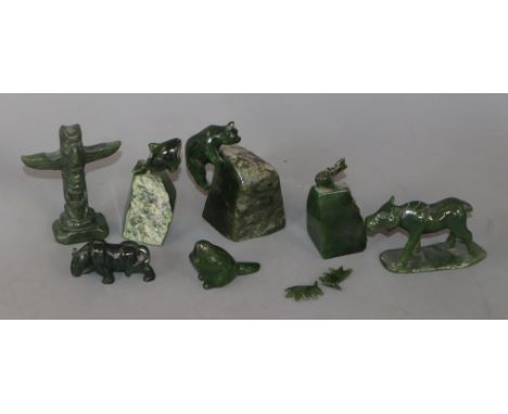 Seven Canadian green jade carvings of animals and a totum