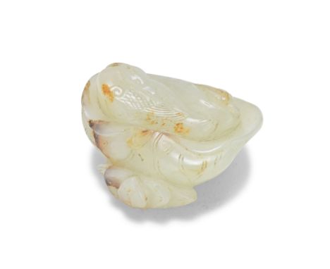 A PALE CELADON AND RUSSET JADE 'MANDARIN DUCKS AND LOTUS' GROUP18th/19th centuryCarved as a pair of Mandarin ducks resting si