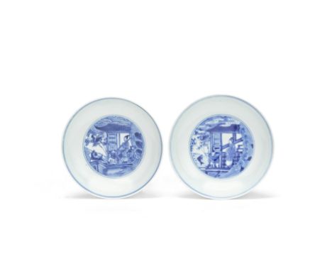 TWO BLUE AND WHITE 'BOY AND CARP' DISHESXuande and Chenghua six-character marks, KangxiEach with the central medallion finely