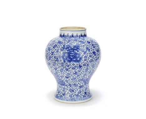 A BLUE AND WHITE 'PEONIES' BALUSTER VASEKangxiOf baluster form, the exterior painted with peonies and dense scrolling foliage