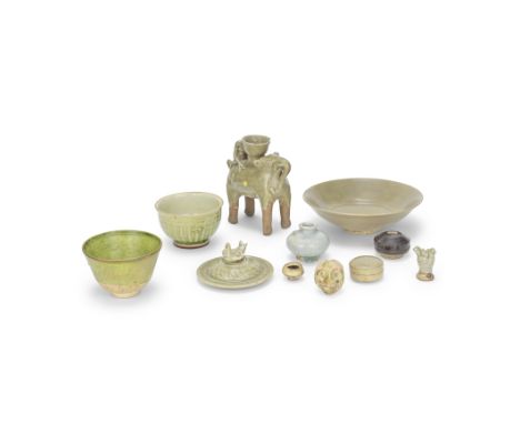 A COLLECTION OF CERAMIC WARESHan Dynasty and laterComprising: a Sawankhalok celadon-glazed figure of a man riding an elephant