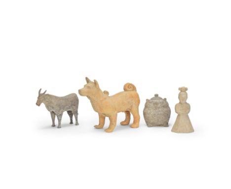 A POTTERY ZOOMORPHIC 'OWL' JAR AND COVER, A LARGE POTTERY FIGURE OF A DOG, A POTTERY MODEL OF AN OX AND A POTTERY MODEL OF A 