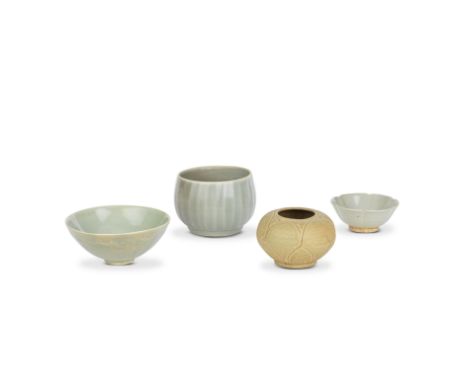 THREE LONGQUAN CELADON-GLAZED BOWLS AND A YUEYAO JARFive Dynasties-Song DynastyComprising: a deep 'lotus' bowl, the exterior 