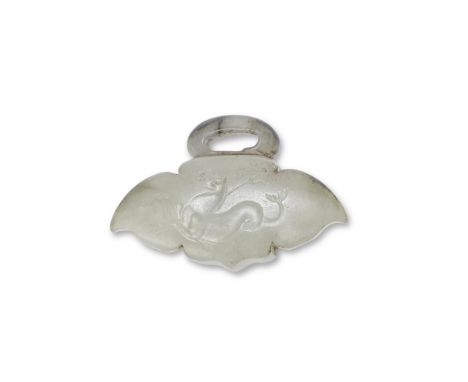 A RARE BLACK AND PALE CELADON JADE 'HIPPOCAMP' BELT BUCKLEQing Dynasty or earlierThe buckle of pale celadon hue with dark bro