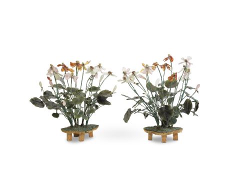 A PAIR OF HARDSTONE FLOWERING PLANTSEarly 20th centuryEach formed as blossoms borne on wrapped wire stems, with serrated leav