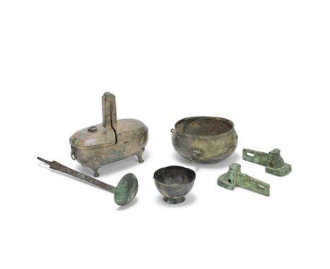A PAIR OF BRONZE LINCH PINS, A BRONZE LADLE AND THREE BRONZE VESSELSZhou Dynasty and laterComprising: a pair of linch pins, w