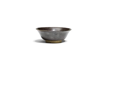 A BLACK-GLAZED 'OIL SPOT' BOWLJin/Yuan DynastyRising from a short ring foot to a flared rim, the interior and most of the ext