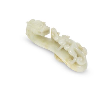 A PALE CELADON JADE 'DRAGON' BELT HOOK18th centuryCarved in high openwork relief with a sinuous crawling chilong facing the d