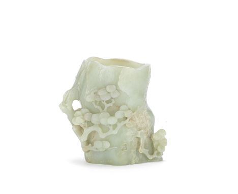 A PALE CELADON JADE 'PINE TRUNK' BRUSHPOT, BITONG18th/19th centuryNaturalistically carved as a section of the trunk of a pine