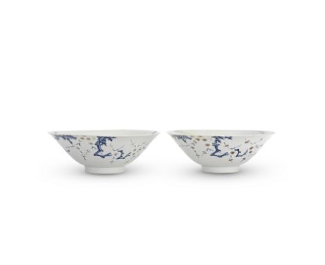 A PAIR OF UNDERGLAZE BLUE, COPPER RED AND WHITE SLIP DECORATED 'PRUNUS' BOWLSChenghua six-character marks, Kangxi Each of con
