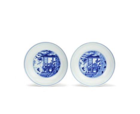 A PAIR OF BLUE AND WHITE 'BOY AND CARP' DISHESXuande six-character marks, KangxiEach with the central medallion finely decora