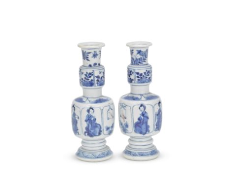 A PAIR OF BLUE AND WHITE AND COPPER-RED MOULDED VASESKangxiEach of stepped double-gourd form, the lower larger section with m