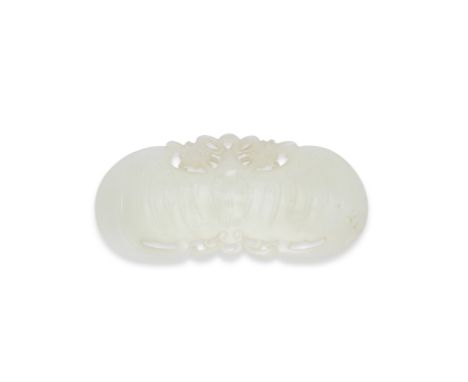 A WHITE JADE 'BAT' CARVINGQing DynastyOf flattened gently curving form, modelled with outstretched wings, with finely carved 