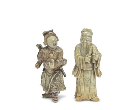 TWO SOAPSTONE FIGURAL CARVINGS17th/18th centuryThe first depicting a warrior, dressed in elaborate armoured robes, an infant 
