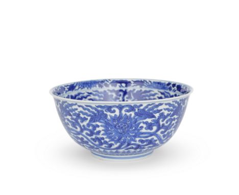 A BLUE AND WHITE 'LOTUS SCROLL' BOWLKangxi six-character mark and of the periodDecorated to the exterior with a continuous lo