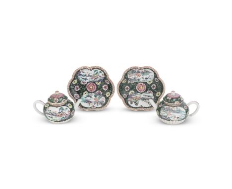 A PAIR OF FAMILLE ROSE BLACK-GROUND TEAPOTS, COVERS AND STANDSYongzhengThe flower-form covers and stands with moulded pink en