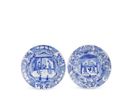 A PAIR OF BLUE AND WHITE FOLIATE RIMMED BOWLSKangxiEach decorated to the well with two ladies and a playful boy, the rim with