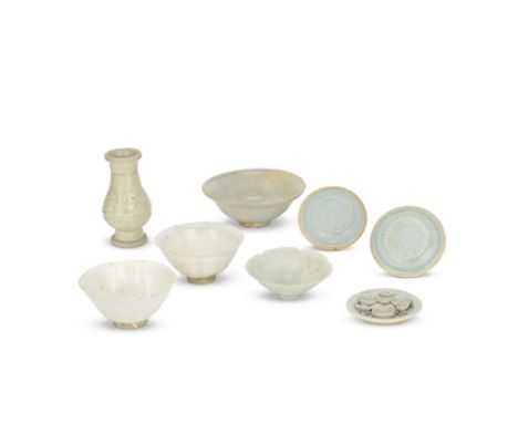 SIX QINGBAI VESSELS AND TWO CIZHOU WHITE-GLAZED JULUXIAN BOWLSSong DynastyComprising: a cosmetics tray; a pair of moulded twi