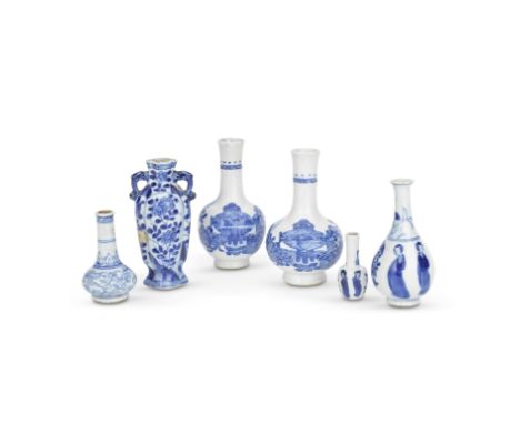 SIX BLUE AND WHITE MINIATURE VASESKangxiComprising: a pair of soft paste vases decorated with scholar's objects, Chenghua mar