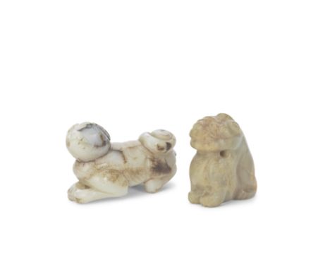 A JADE 'MYTHICAL BEAST' CARVING AND A JADE 'HOUND' CARVINGMing and Qing DynastyThe seated beast facing forwards and with its 