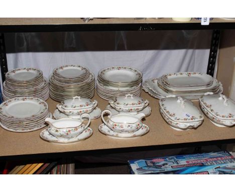 Limoges dinner service comprising approximately sixty pieces including tureens, gravy boats, meat plates and various size pla