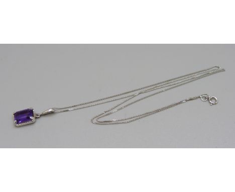 A 9ct white gold chain, 0.8g, with amethyst set pendant 