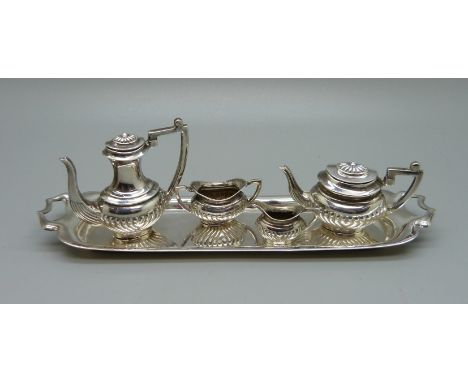A hallmarked silver miniature tea service and tray, Birmingham 1970, tray 14.5cm 