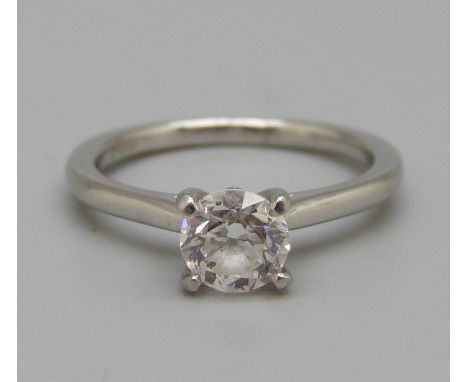 A platinum set round brilliant cut diamond ring, 0.80 carat diamond weight, colour D, clarity SI2, 3.6g, L 