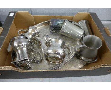 Two silver plated trays, a plated tea service and pewter mugs **PLEASE NOTE THIS LOT IS NOT ELIGIBLE FOR POSTING AND PACKING*