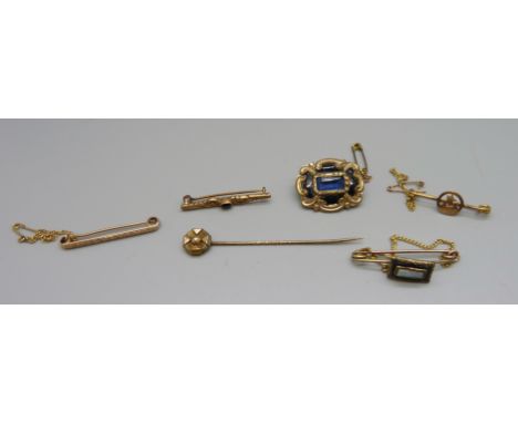 Two 9ct gold brooches including one depicting a ship, three other brooches and a stick pin, (two gold brooches 4g) 