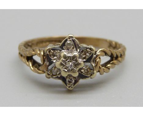 A 9ct gold cluster ring set with white stones, 2g, L 