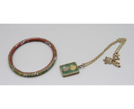 A cloisonne bangle and a jade pendant on a fine chain, pendant a/f 