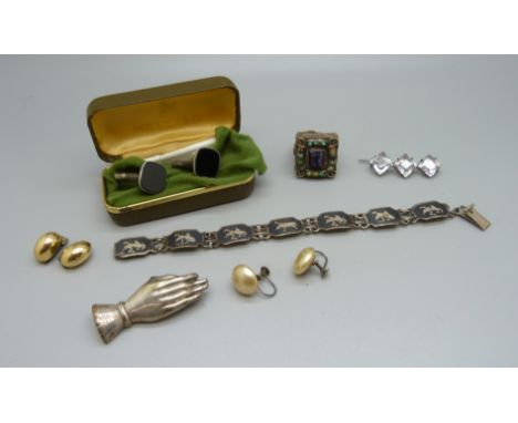 A white metal hand brooch, a Siam silver Niello bracelet, cufflinks, etc., (ring a/f) 
