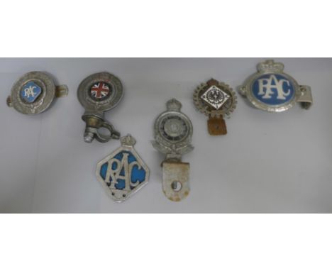 A collection of car badges, RAC, two marked Royal Automobile Club Associate and one marked The Royal Automobile Club 