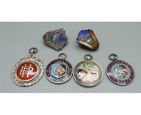 Four silver fob medals including two Buckinghamshire AAA and two silver and enamel NUR 30 Years badges, 59g 