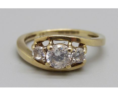 A 9ct gold ring set with cubic zirconia, 2.4g, M 