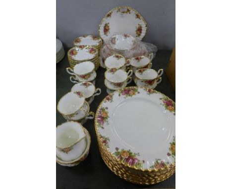 A Royal Albert Old Country Roses twelve setting tea and dinner service with sandwich plates and bowls 