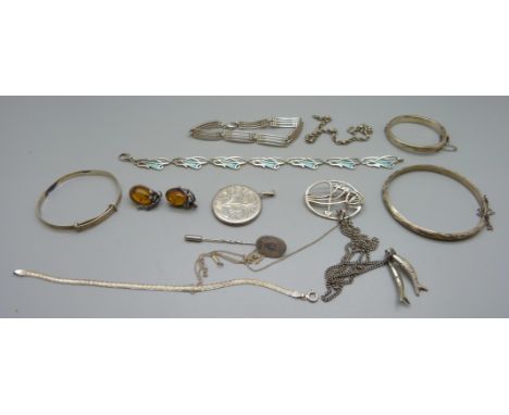 A collection of silver jewellery including Mackintosh style and a baby's bangle 