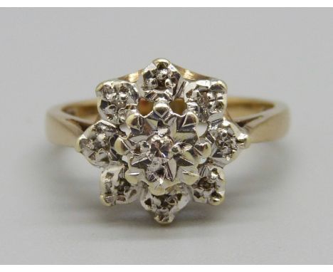 A 9ct gold cluster ring with illusion set diamonds, 3.2g, L 