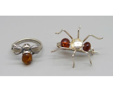 A silver and amber bee ring and a bug brooch 